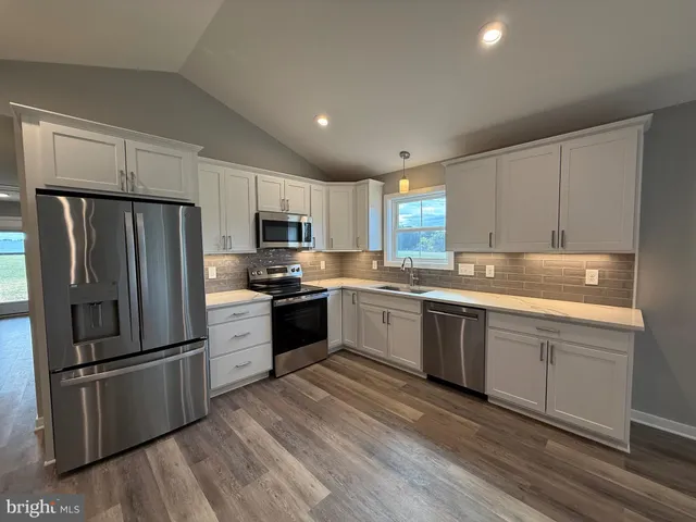 a storage room with washer and dryer