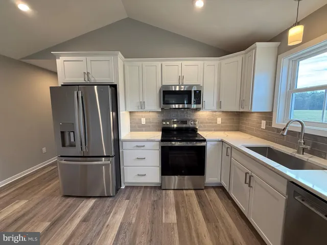 a bathroom with a toilet and a bathtub