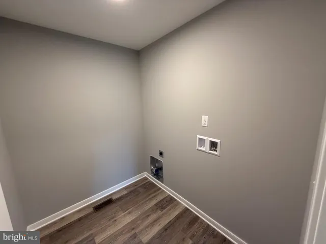 a bathroom with a sink toilet a mirror and shower