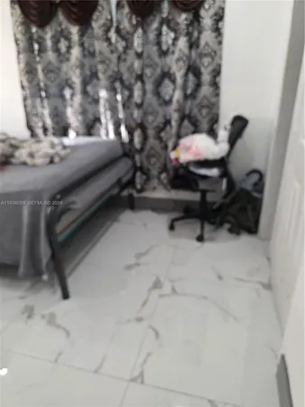 a view of livingroom with furniture