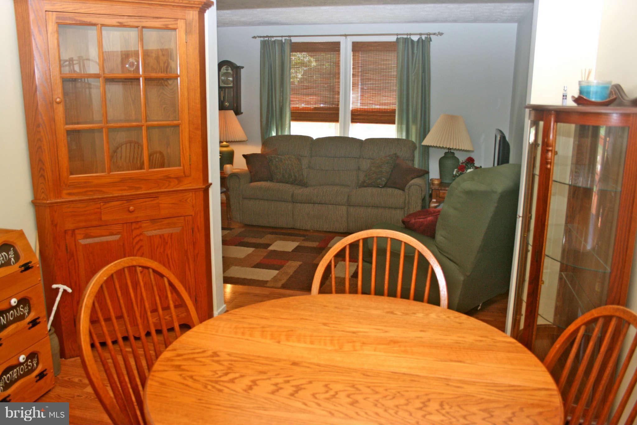 127 Cove Point Road Lusby, MD 20657 - Photo 7 of 27 Dining area connects to kitchen and living room