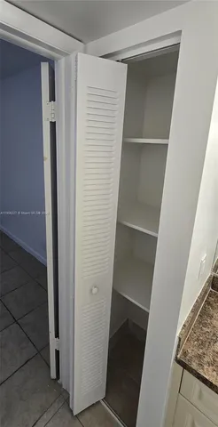 a bathroom with a toilet and a bathtub