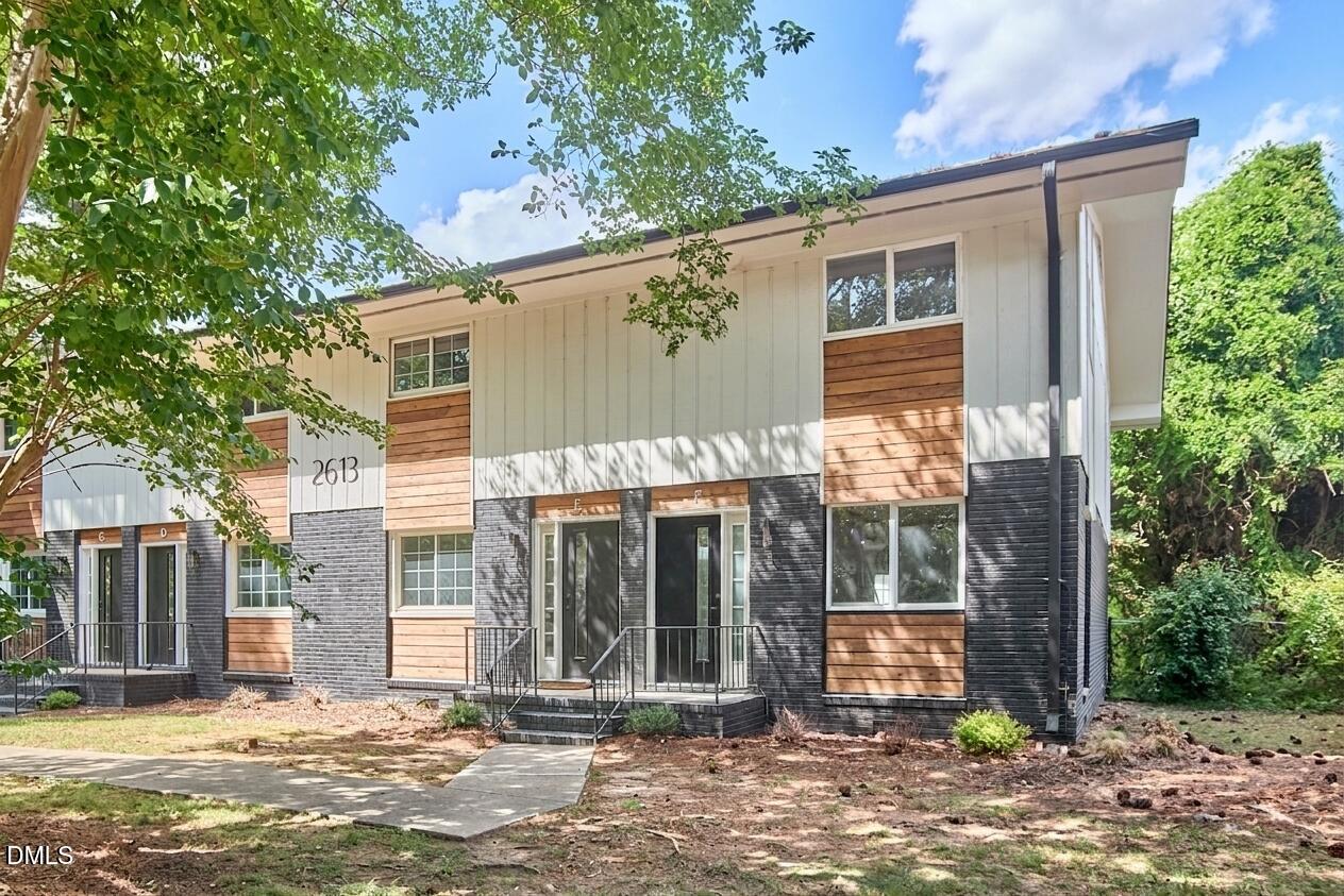 2613 McNeil Street, Unit E Raleigh, NC 27608 - Photo 1 of 28 a view of a house with brick walls