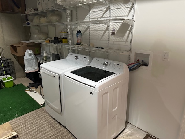 21839 Riviera Court, Unit G Mundelein, IL 60060 - Photo 12 of 17 a utility room with dryer and washer