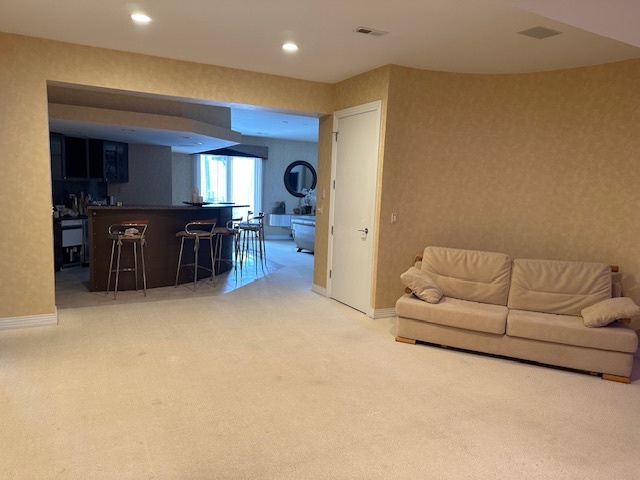 21839 Riviera Court, Unit G Mundelein, IL 60060 - Photo 16 of 17 a living room with furniture