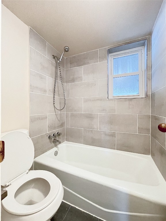 3400 Speedway, Unit 105 Austin, TX 78705 - Photo 12 of 18 a bathroom with a sink a toilet and shower