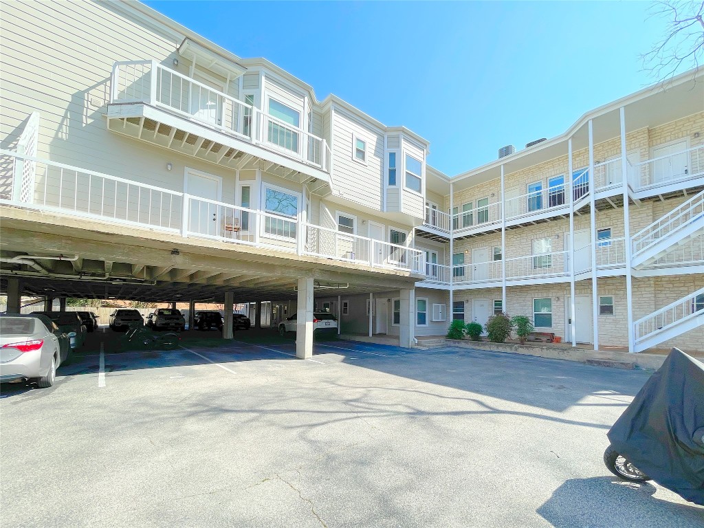 3400 Speedway, Unit 105 Austin, TX 78705 - Photo 16 of 18 a view of a building with car parked