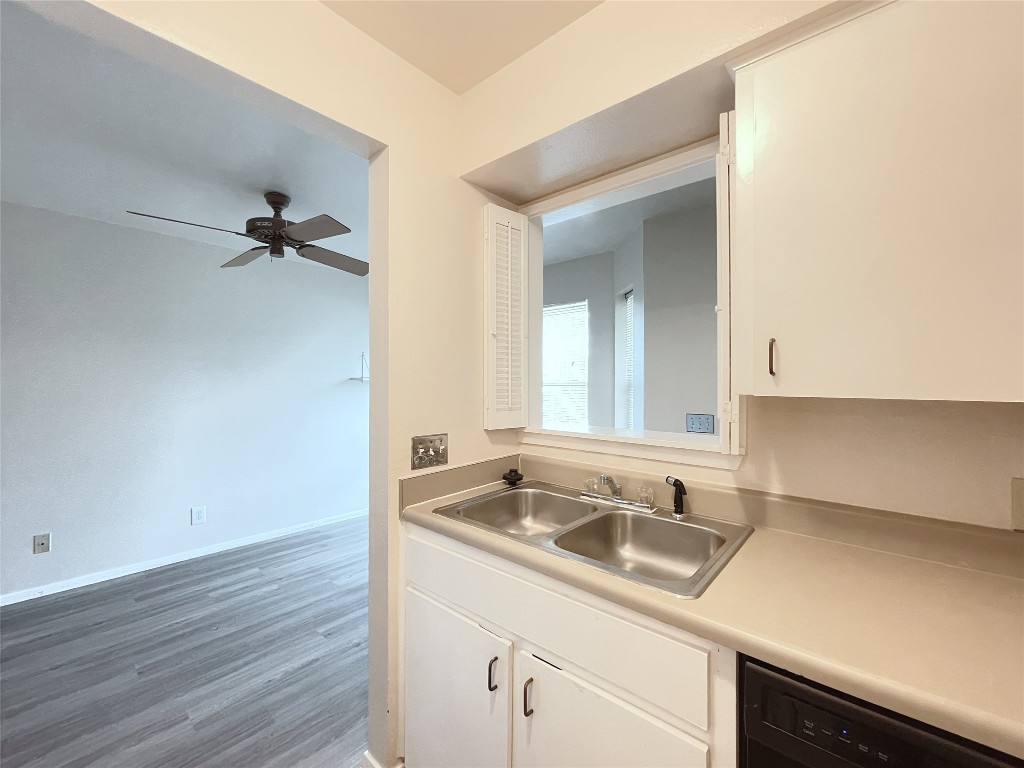 3400 Speedway, Unit 105 Austin, TX 78705 - Photo 8 of 18 a bathroom with a sink and a mirror