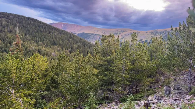 a view of mountain view with mountains in the background