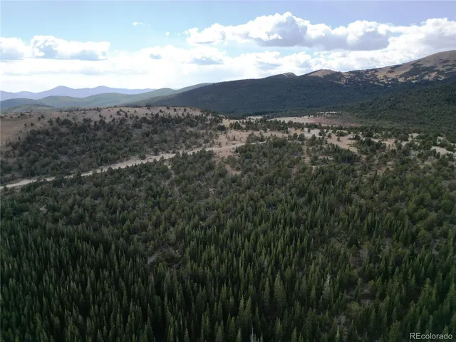 a view of a city with mountain