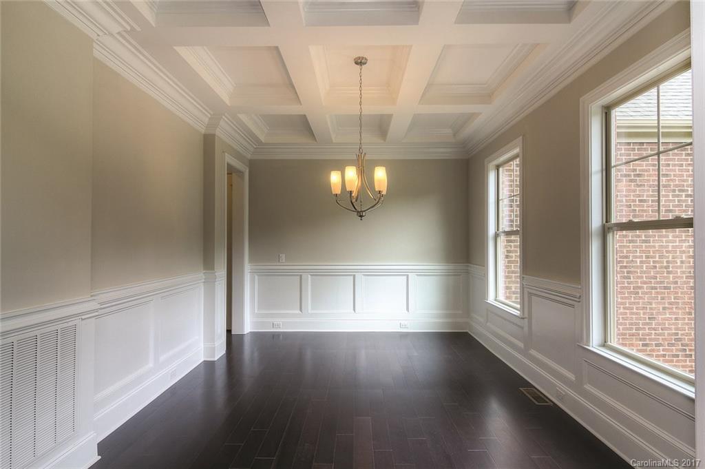 160 Forsythia Lane, Unit 739 Tega Cay, SC 29708 - Photo 2 of 24 a view of empty room with wooden floor and fan