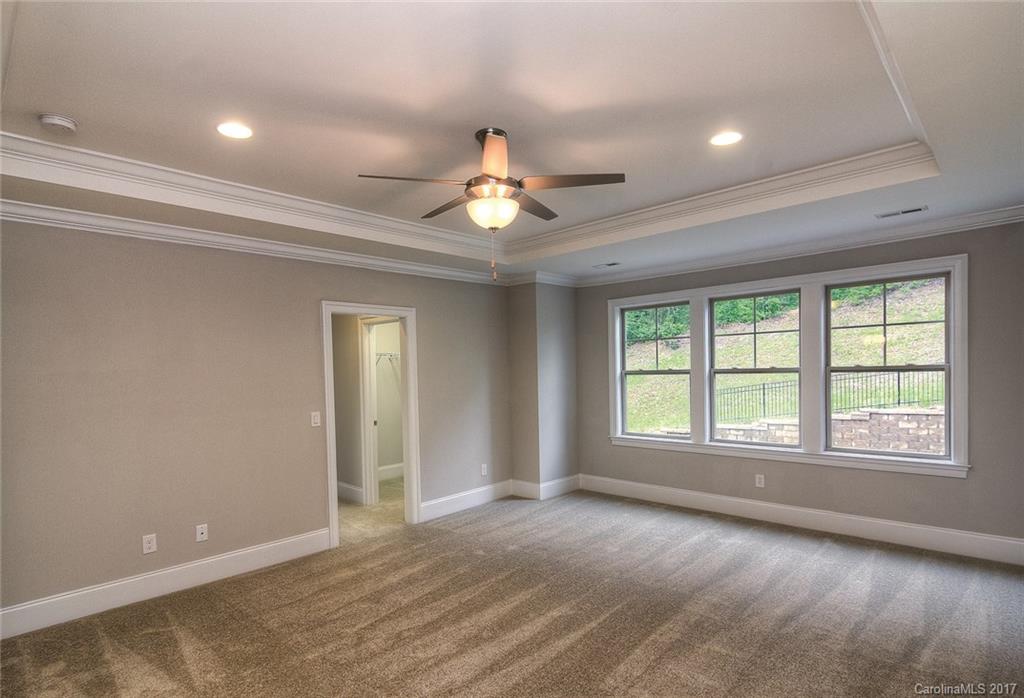 160 Forsythia Lane, Unit 739 Tega Cay, SC 29708 - Photo 15 of 24 a view of an empty room with a window