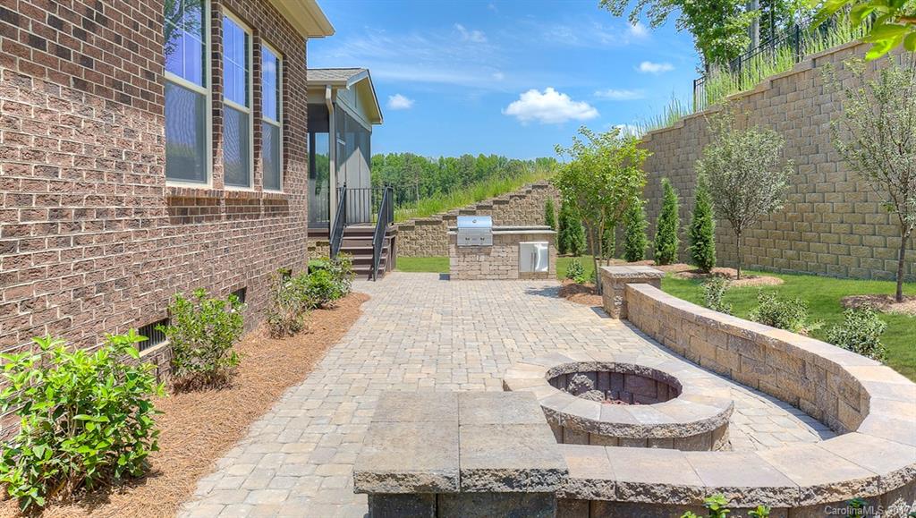 160 Forsythia Lane, Unit 739 Tega Cay, SC 29708 - Photo 18 of 24 a house view with a outdoor space