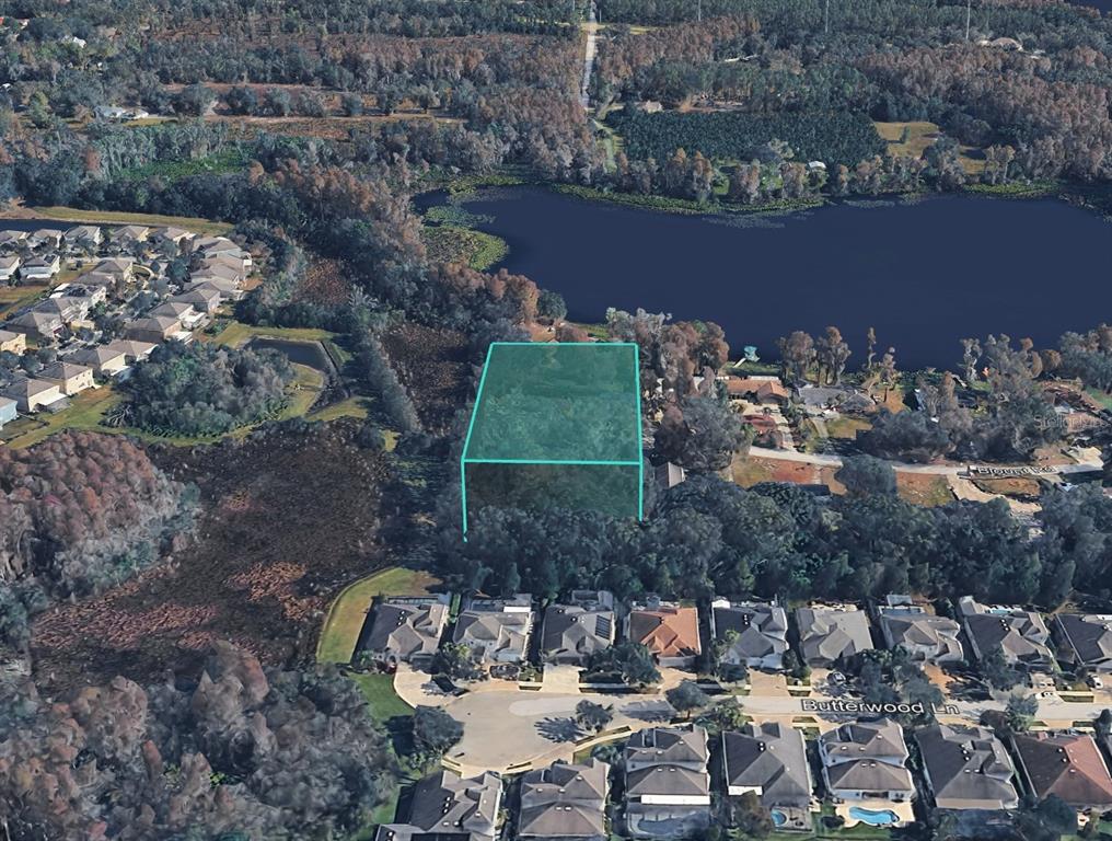 Blount Road Lutz, FL 33558 - Photo 20 of 33 a view of a house with a yard and sitting area