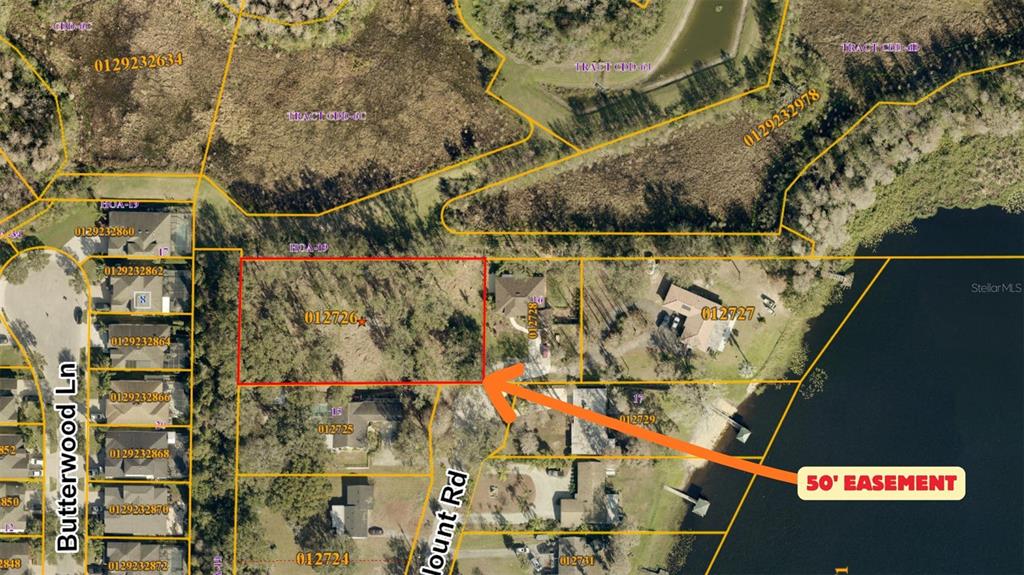 Blount Road Lutz, FL 33558 - Photo 32 of 33 a picture of water with a building in the background