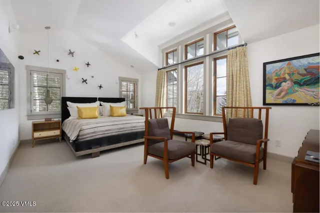 a spacious bathroom with a sink mirror and a bathtub