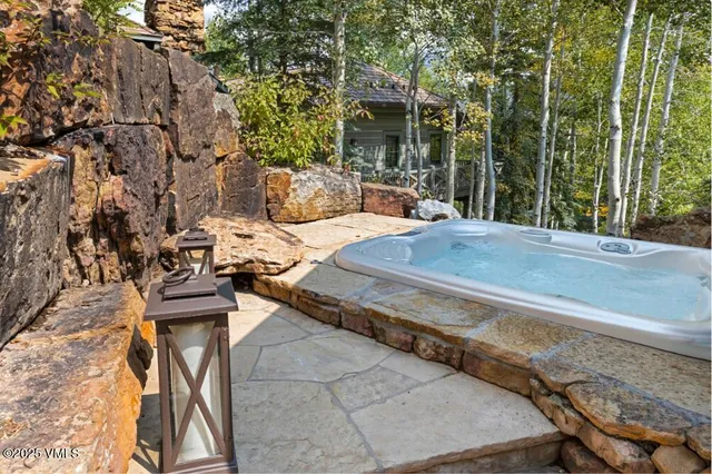 a view of swimming pool with a patio