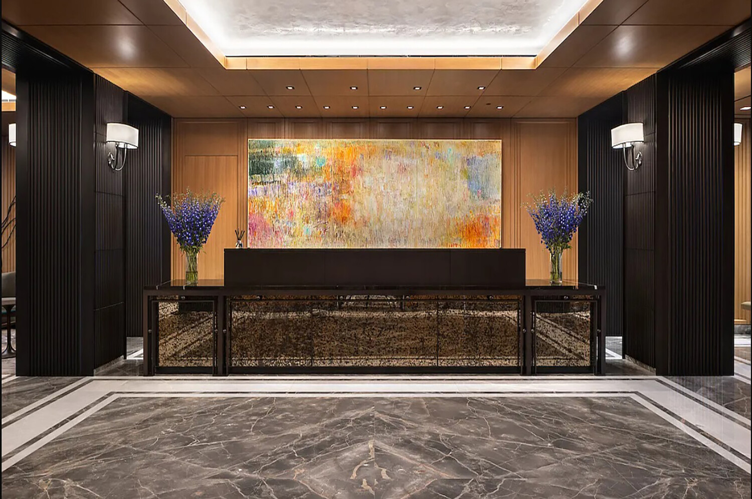 210 Warren Street, Unit 9G Manhattan, NY 10282 - Photo 10 of 11 a living room with a fireplace and a flat screen tv