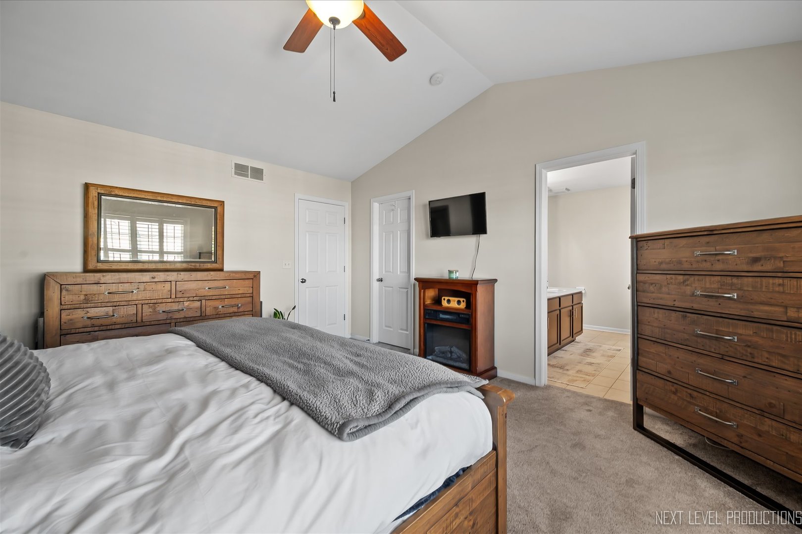 1164 Freedom Road Elburn, IL 60119 - Photo 18 of 31 a bedroom with a bed and a television