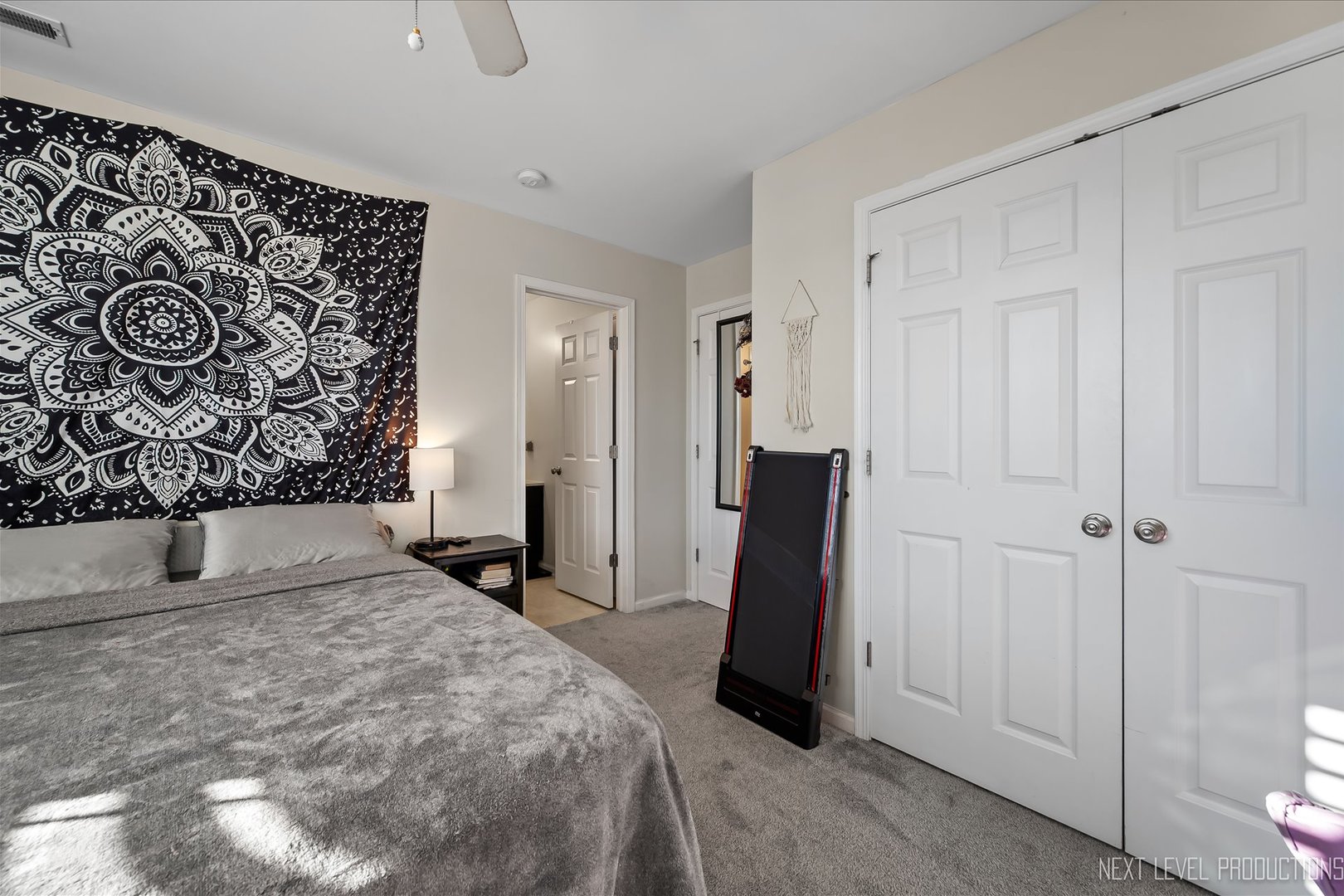 1164 Freedom Road Elburn, IL 60119 - Photo 22 of 31 a bedroom with a bed and a door