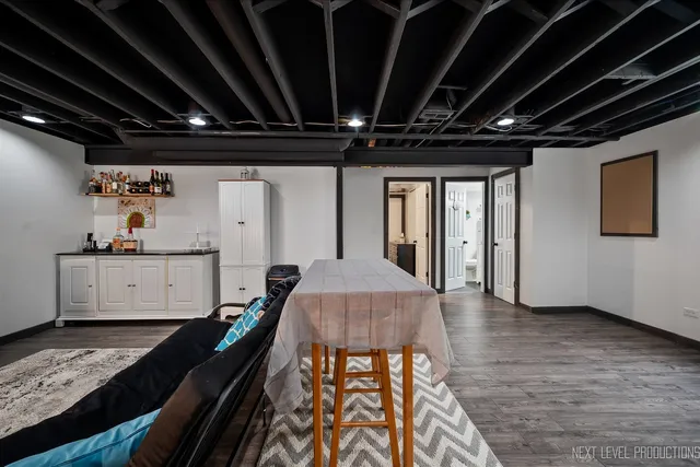 a view of a room with wooden walls