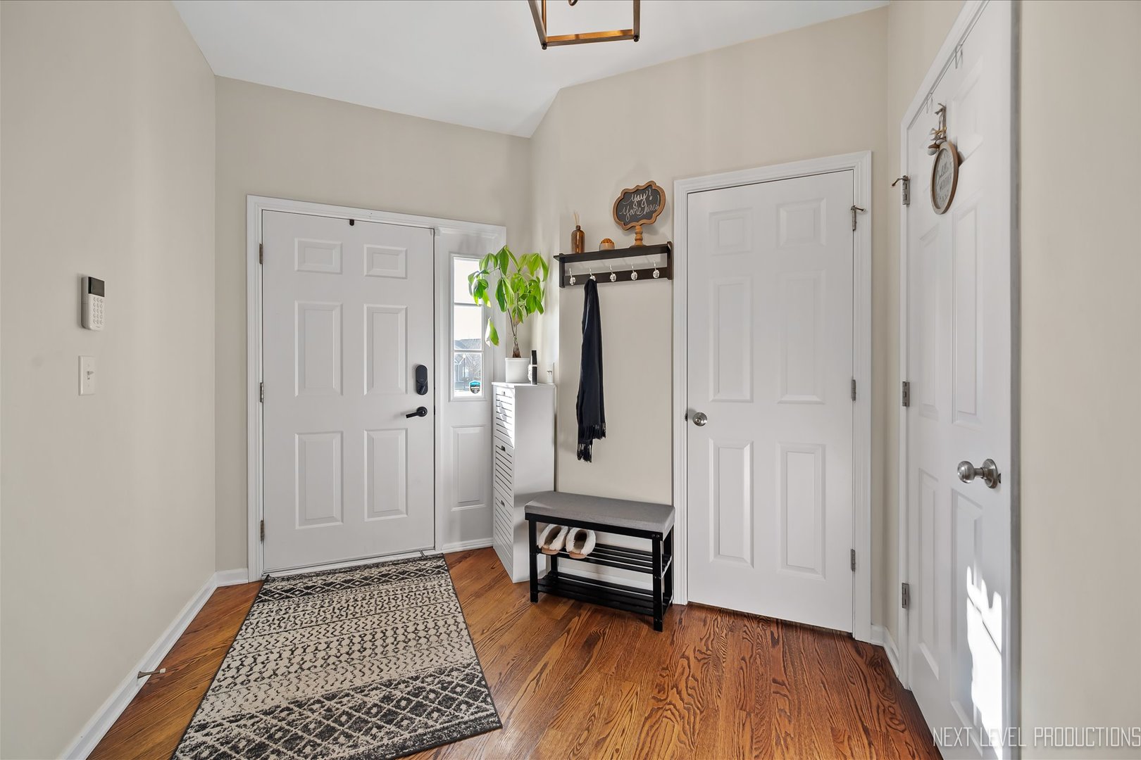 1164 Freedom Road Elburn, IL 60119 - Photo 4 of 31 a view of a room with wooden floor and a rug
