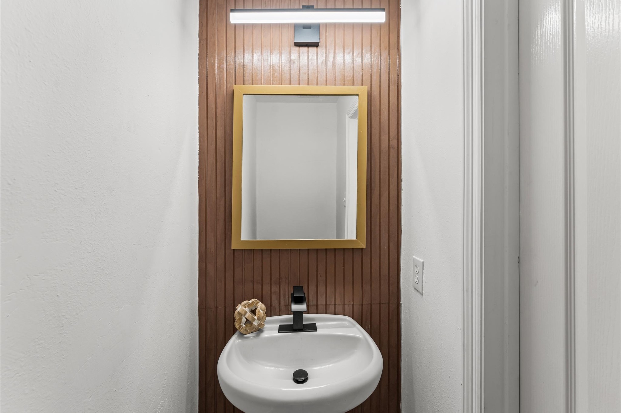 2830 Fern Hill Drive Spring, TX 77373 - Photo 15 of 22 a bathroom with a sink and a mirror