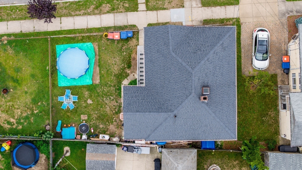 135-137 Query Street New Bedford, MA 02745 - Photo 16 of 17 an aerial view of a house with a swimming pool