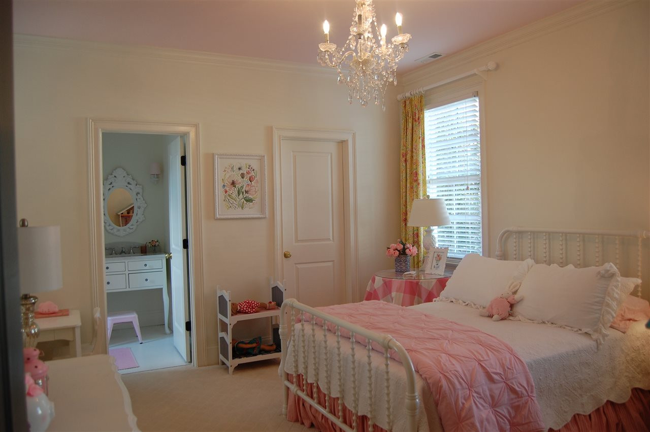 2620 Davis Street Raleigh, NC 27608 - Photo 25 of 28 Bedroom complete with custom bookshelves and window seat, and full bathroom. Bedroom