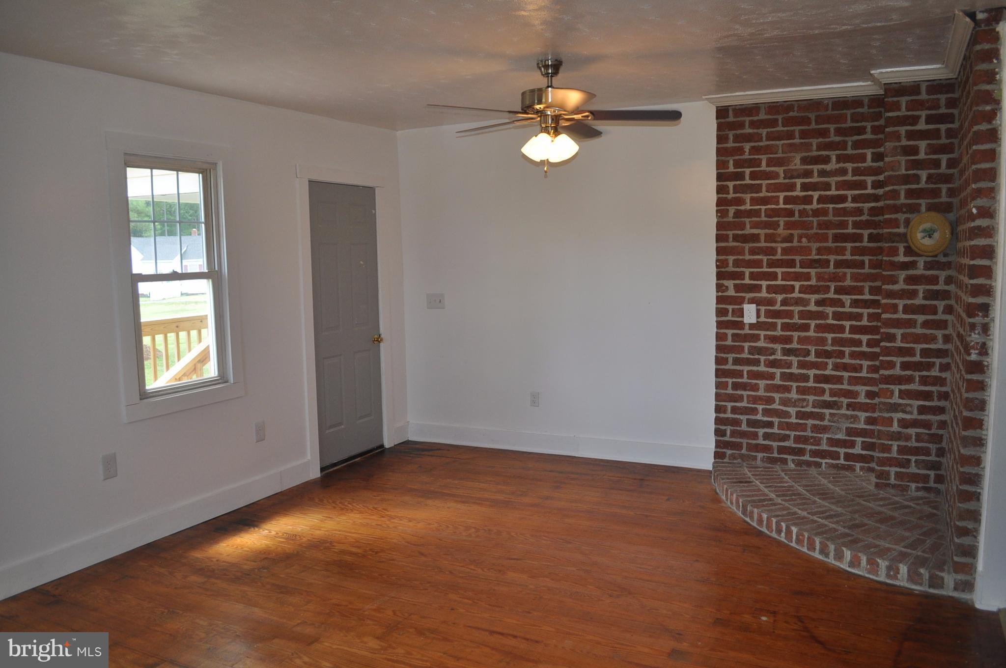2263 Pomona Road Colonial Beach, VA 22443 - Photo 16 of 28 a view of an empty room with a window