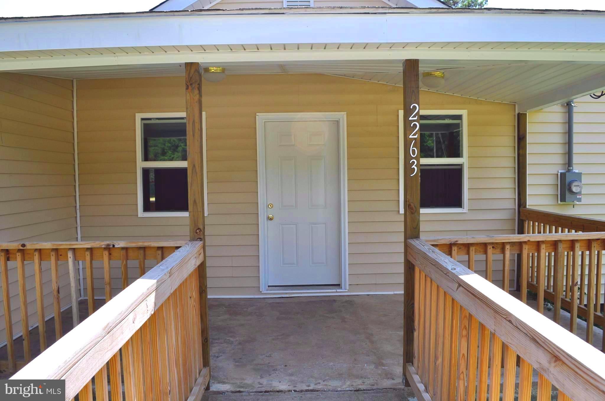 2263 Pomona Road Colonial Beach, VA 22443 - Photo 3 of 28 a balcony with window