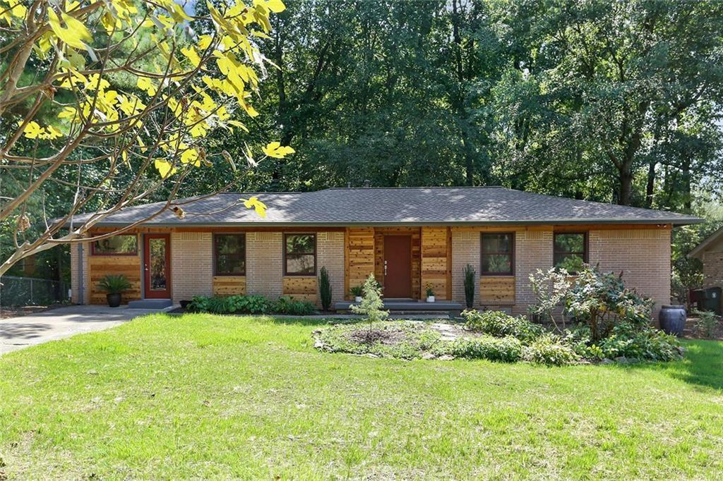 1995 Commodore Lane Atlanta, GA 30341 - Photo 1 of 32 front view of a house with a yard