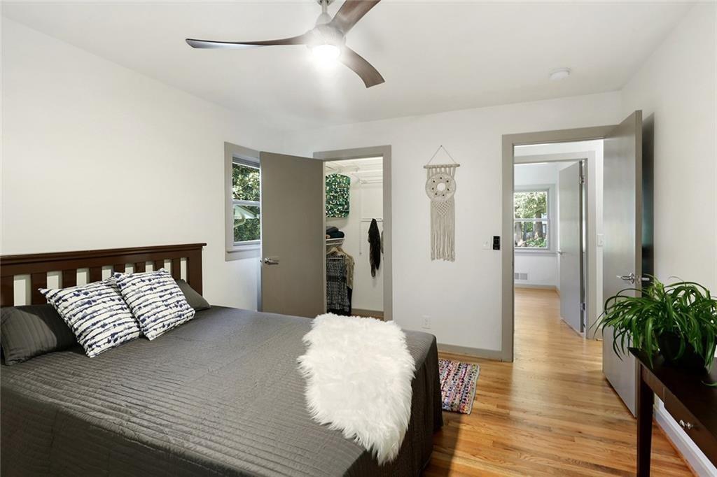 1995 Commodore Lane Atlanta, GA 30341 - Photo 11 of 32 a bed room with a bed and a potted plant