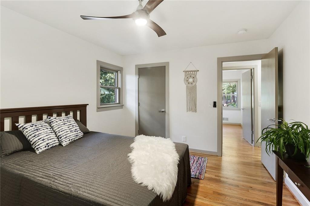 1995 Commodore Lane Atlanta, GA 30341 - Photo 12 of 31 a bed room with a bed and a potted plant