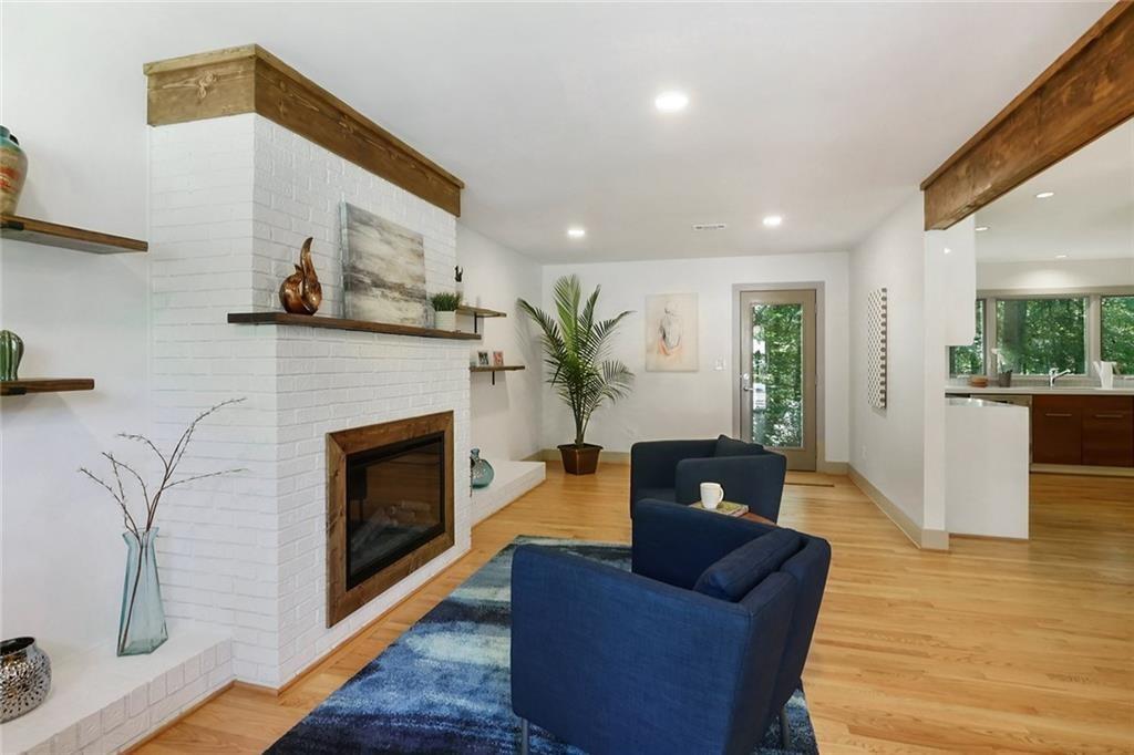 1995 Commodore Lane Atlanta, GA 30341 - Photo 14 of 32 a living room with furniture and a fireplace
