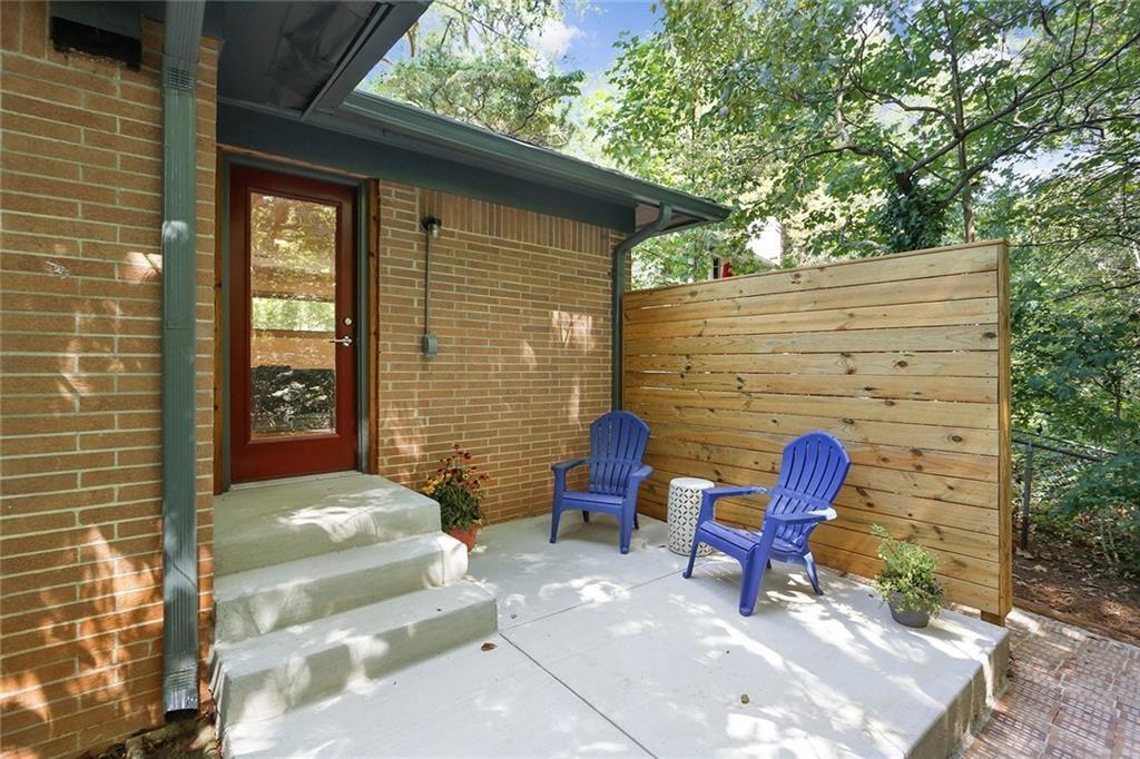 1995 Commodore Lane Atlanta, GA 30341 - Photo 21 of 32 a backyard of a house with outdoor seating