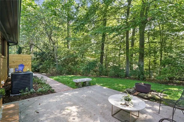 a garden view with a seating space