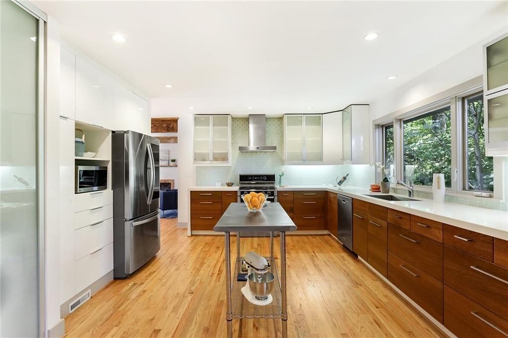 1995 Commodore Lane Atlanta, GA 30341 - Photo 28 of 32 a kitchen with stainless steel appliances granite countertop a refrigerator a stove and a wooden floors