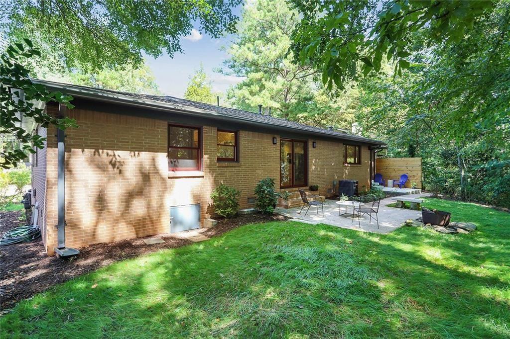 1995 Commodore Lane Atlanta, GA 30341 - Photo 29 of 32 a view of backyard with a patio and outdoor seating