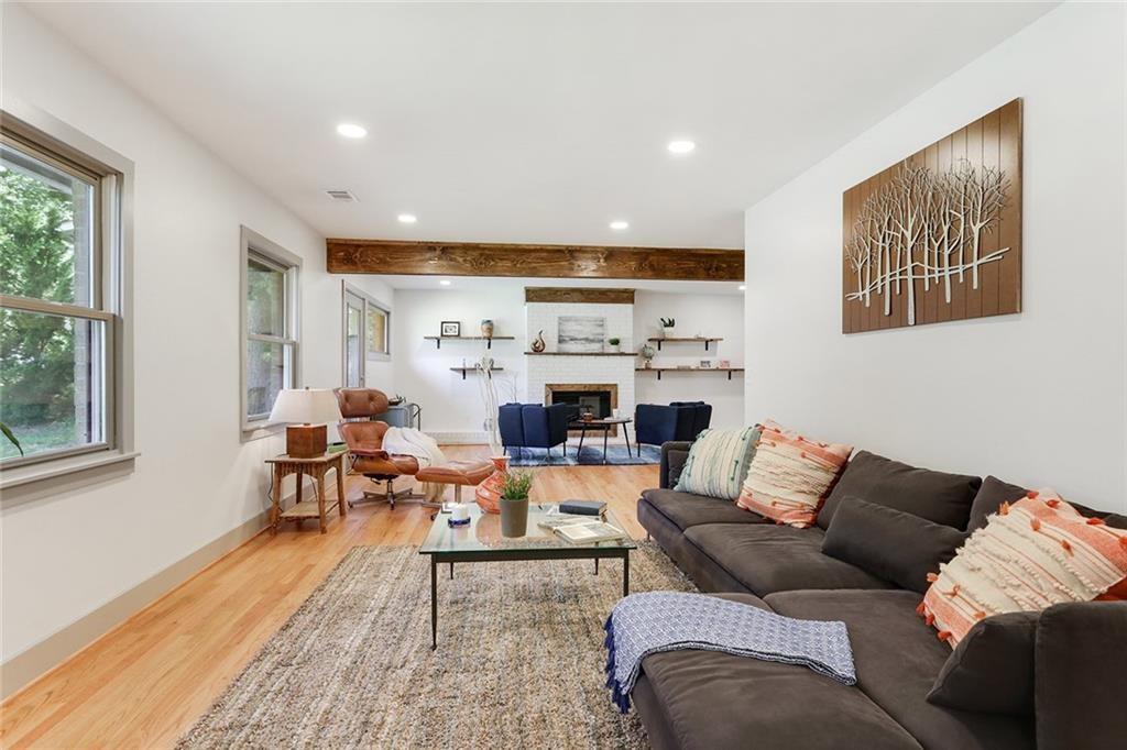 1995 Commodore Lane Atlanta, GA 30341 - Photo 8 of 32 a living room with furniture or couch and a large window