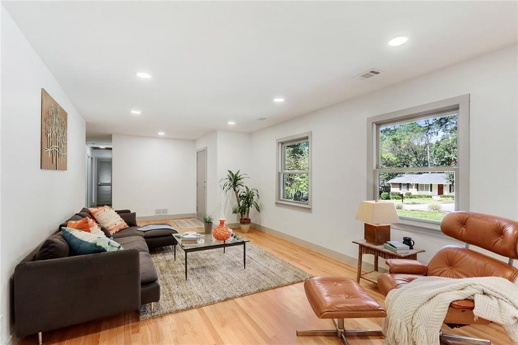 1995 Commodore Lane Atlanta, GA 30341 - Photo 10 of 32 a living room with furniture and a window
