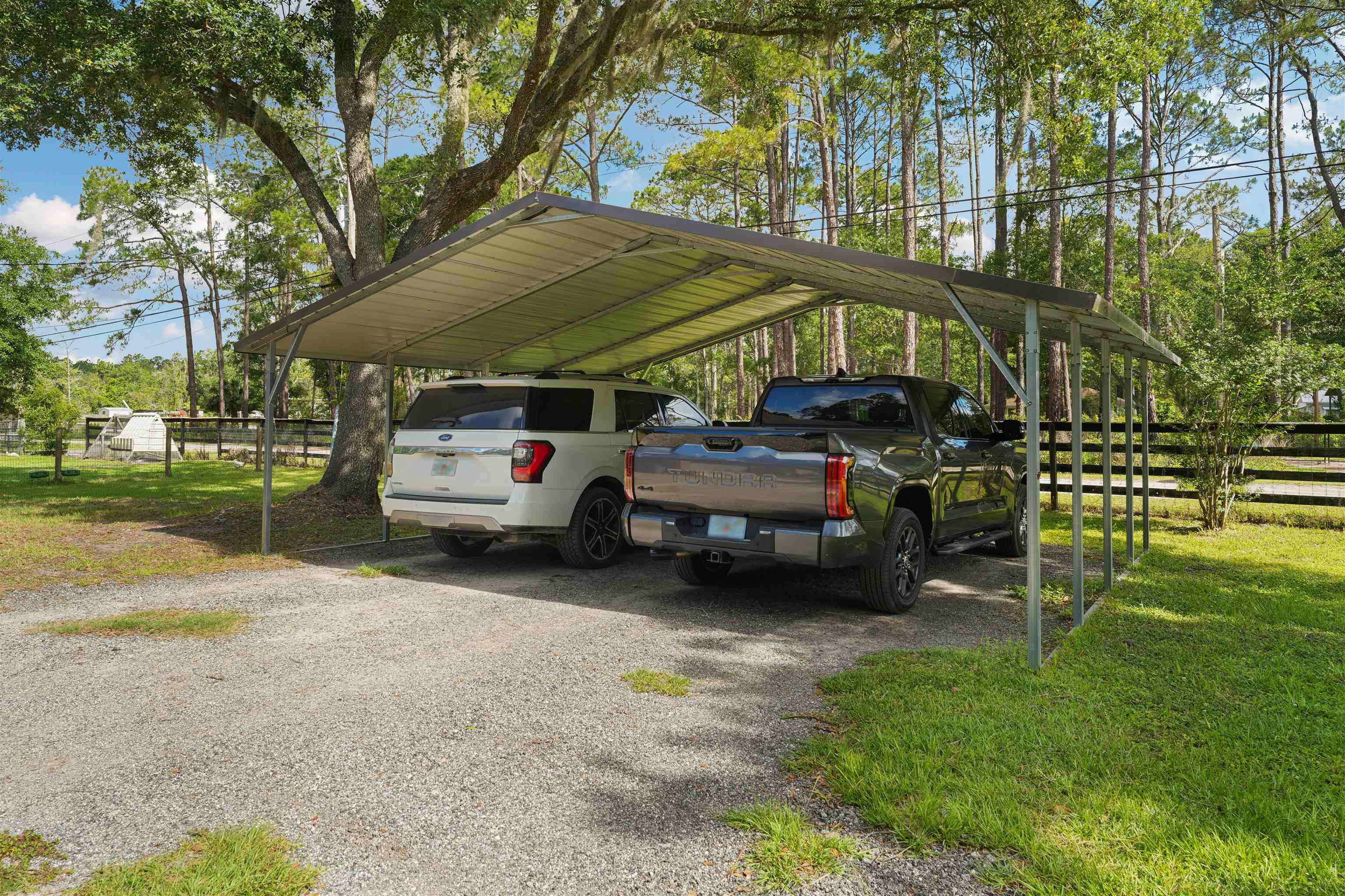 1805 Bennett Road St. Augustine, FL 32092 - Photo 60 of 65 a view of a cars parked in front of a house