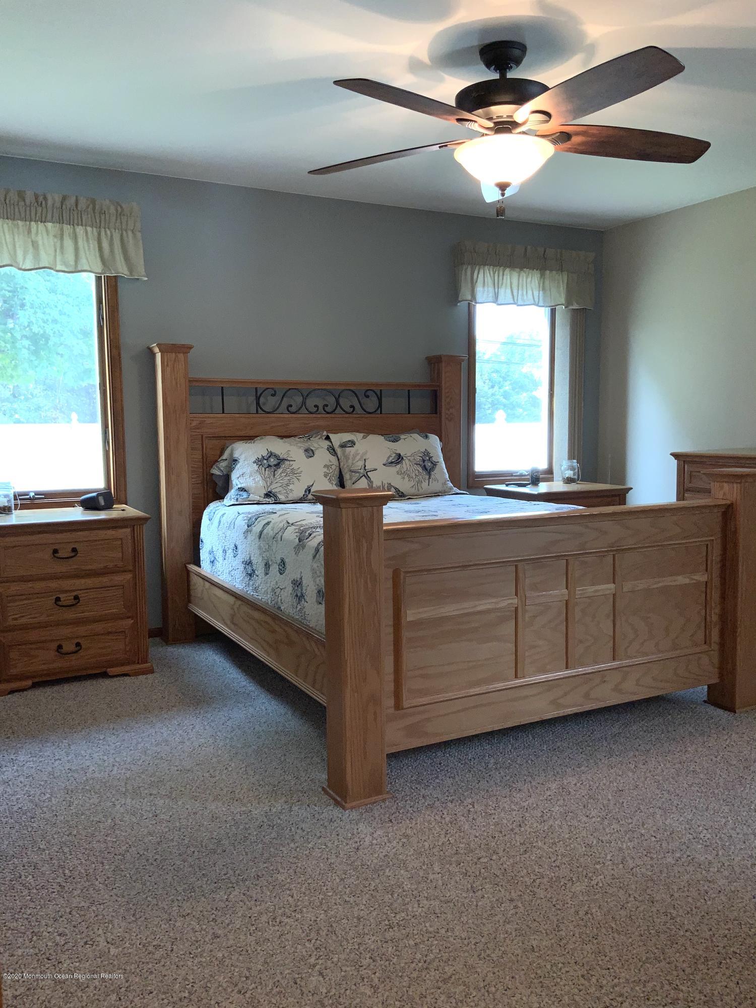 202 Pleasant Drive Brick, NJ 08723 - Photo 25 of 46 a bed room with a bed and a window