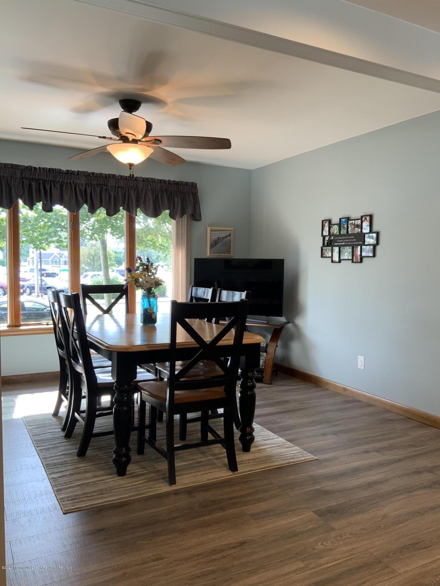 202 Pleasant Drive Brick, NJ 08723 - Photo 10 of 46 a view of a dining room with furniture window and outside view