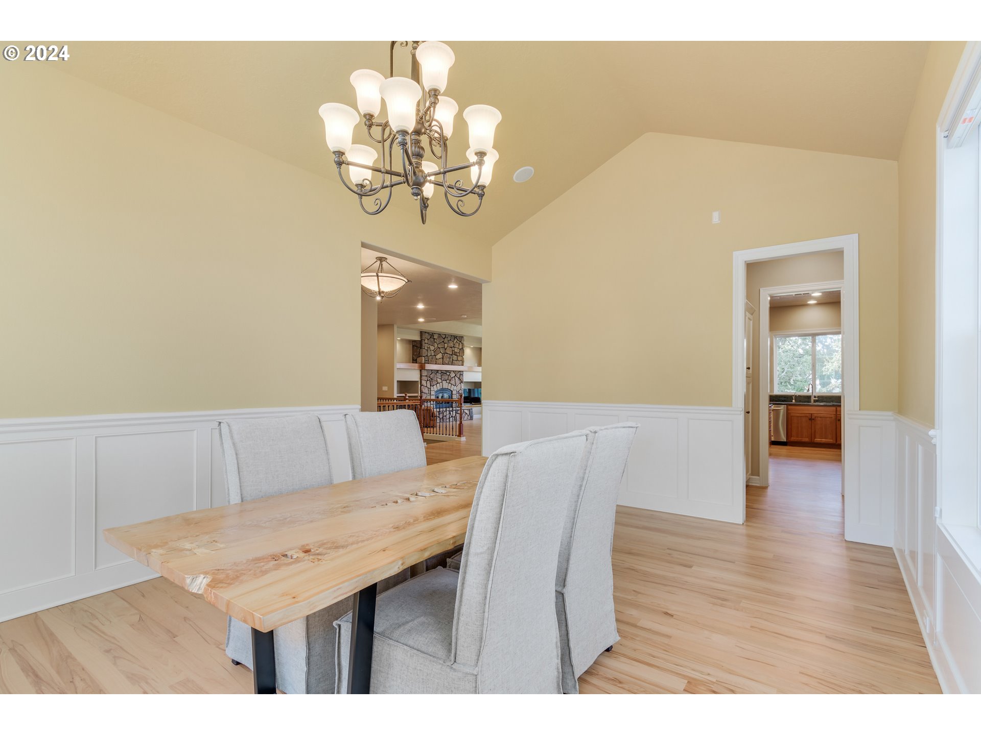 6164 Fernhill Loop Springfield, OR 97478 - Photo 19 of 48 a view of a dining room with furniture and chandelier