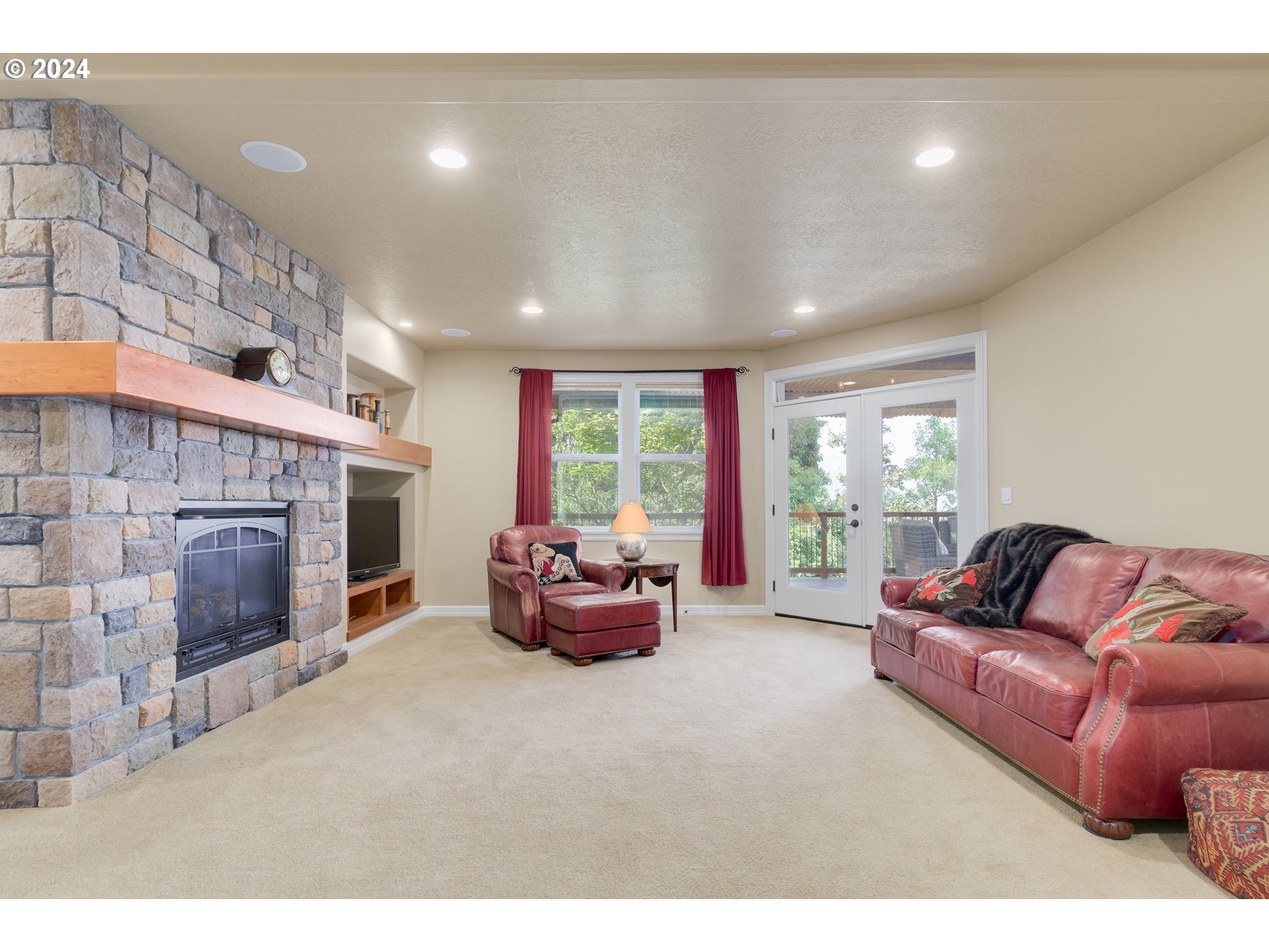 6164 Fernhill Loop Springfield, OR 97478 - Photo 31 of 48 a living room with furniture and a fireplace