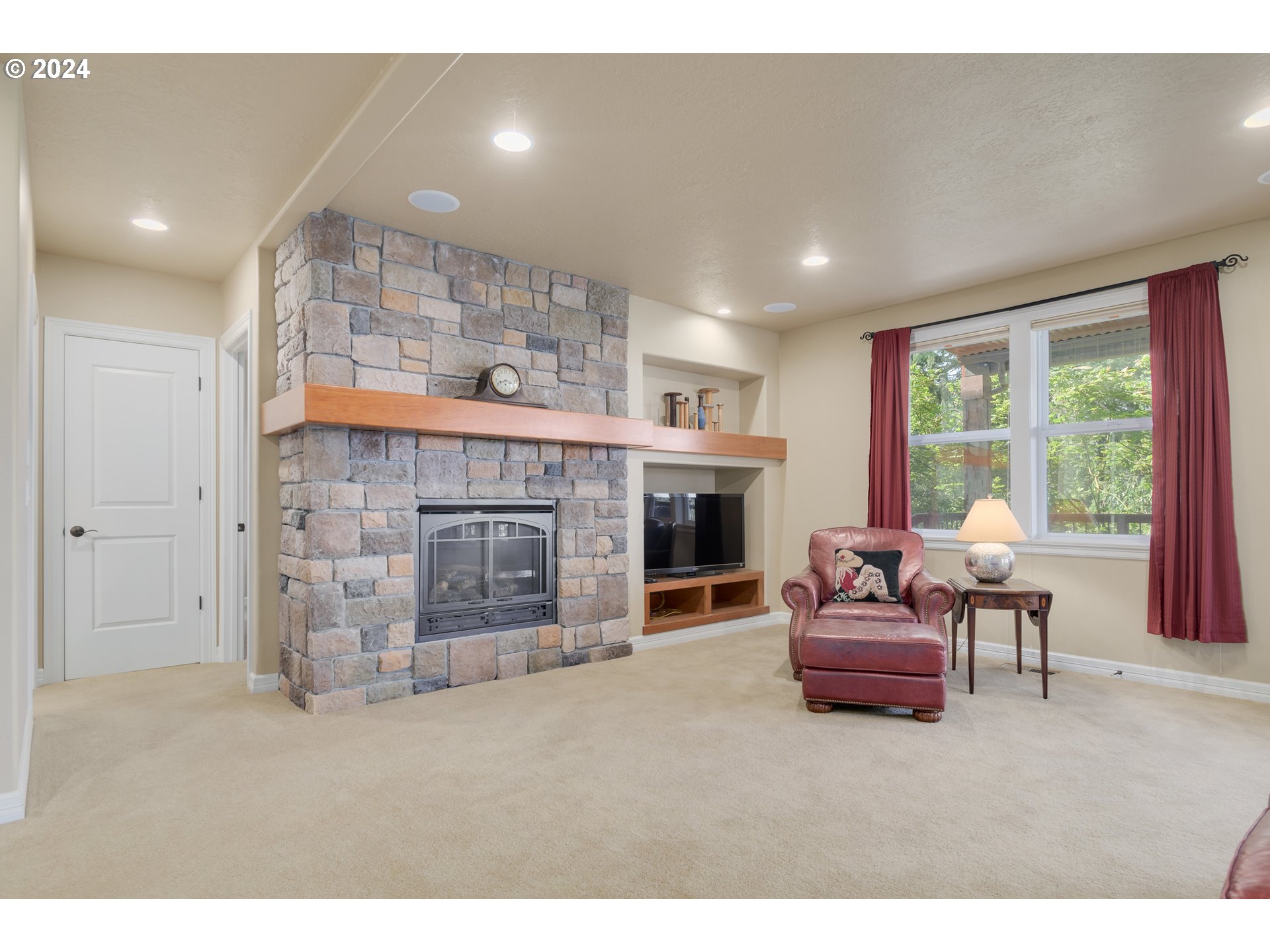 6164 Fernhill Loop Springfield, OR 97478 - Photo 32 of 48 a living room with furniture and a fireplace