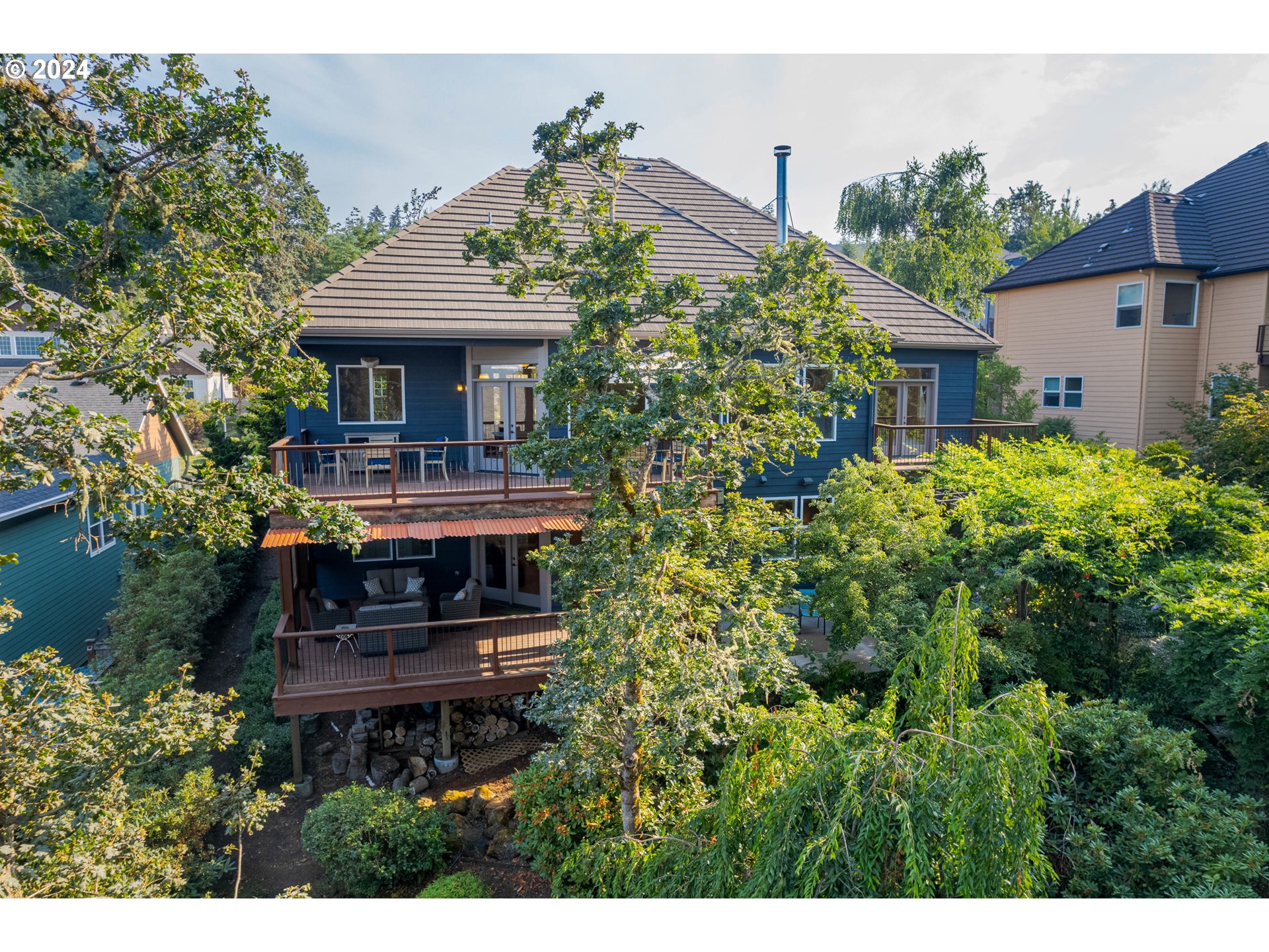 6164 Fernhill Loop Springfield, OR 97478 - Photo 46 of 48 a view of a house with a small yard and plants