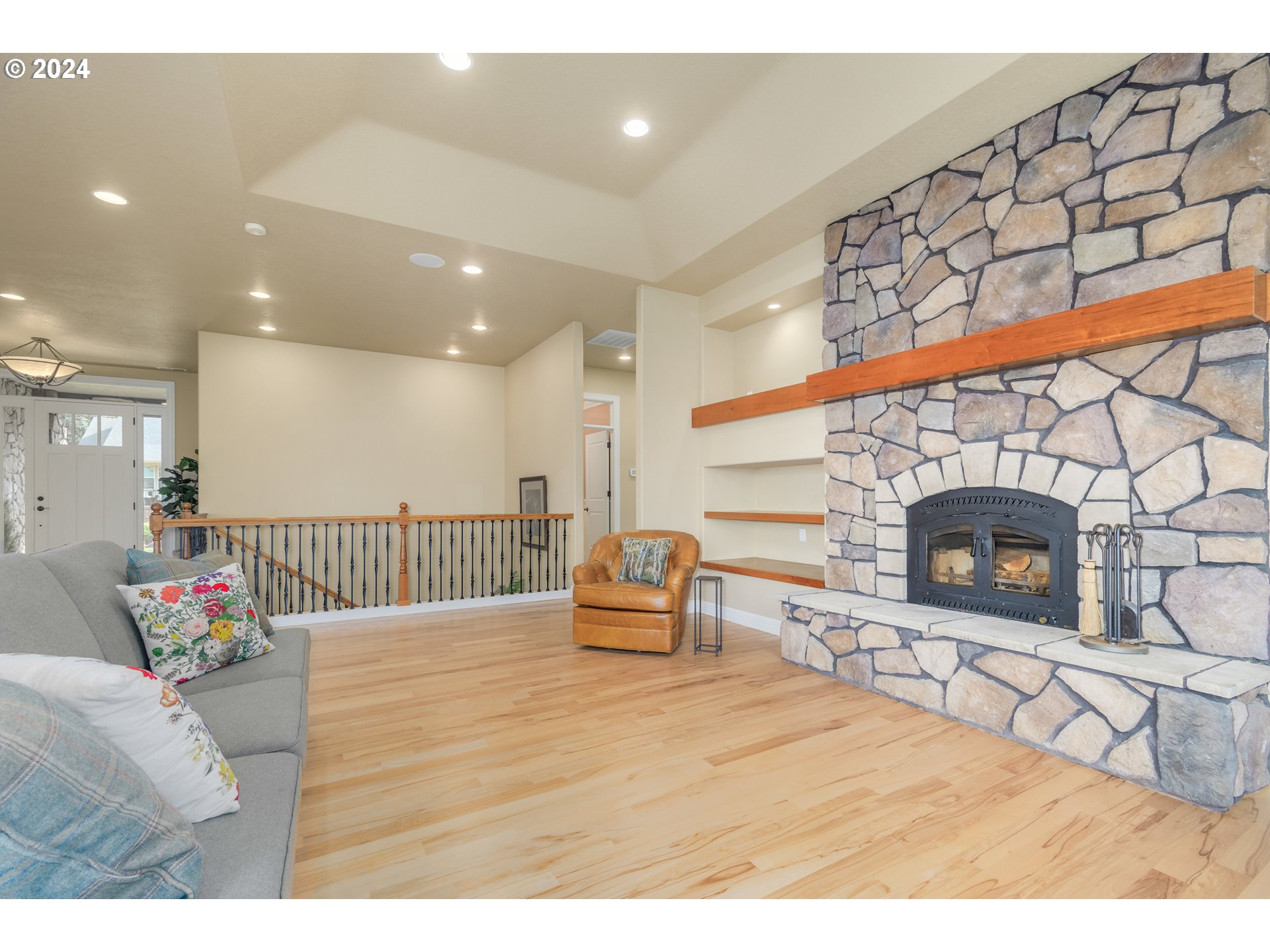 6164 Fernhill Loop Springfield, OR 97478 - Photo 7 of 48 a living room with furniture and a fireplace