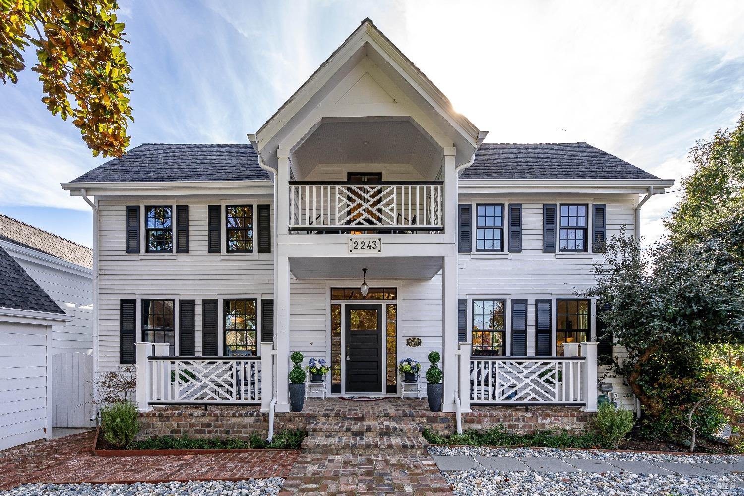 2243 Redwood Road Napa, CA 94558 - Photo 1 of 1 a front view of a house with a garden